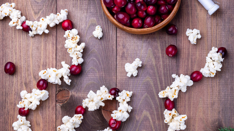Homemade garland with popcorn and cranberries