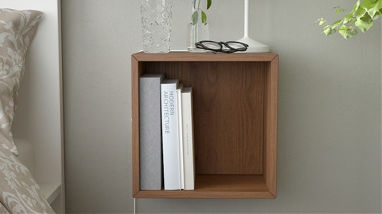 wall-mounted EKET Cabinet as bedside table