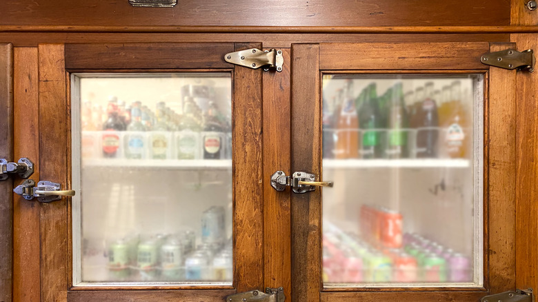 An old-school wooden refrigerator designed to hold ice