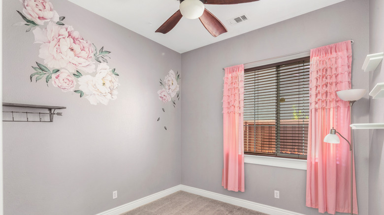 Large flower decals on a grey wall