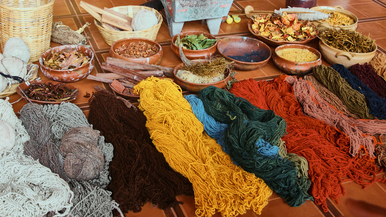 colorful dyed wool near plants