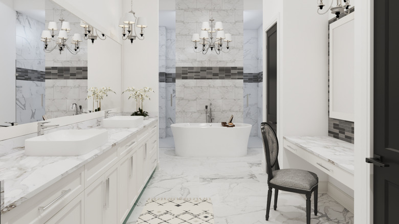 Upscale bathroom covered in marble tile