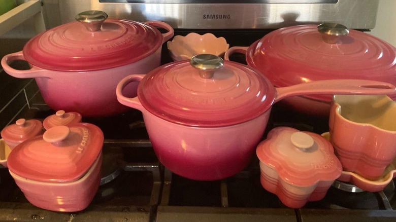Berry colored Le Creuset cookware, in ombre pink shades