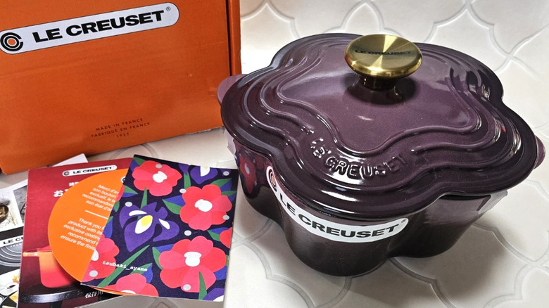 A beautiful, flower-shaped Le Creuset dish in the rare, purple color known as Fig.