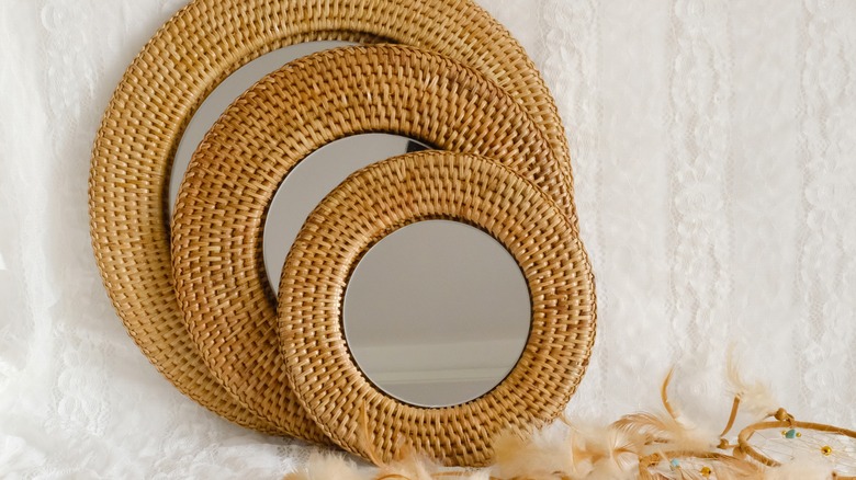 Three rattan mirrors