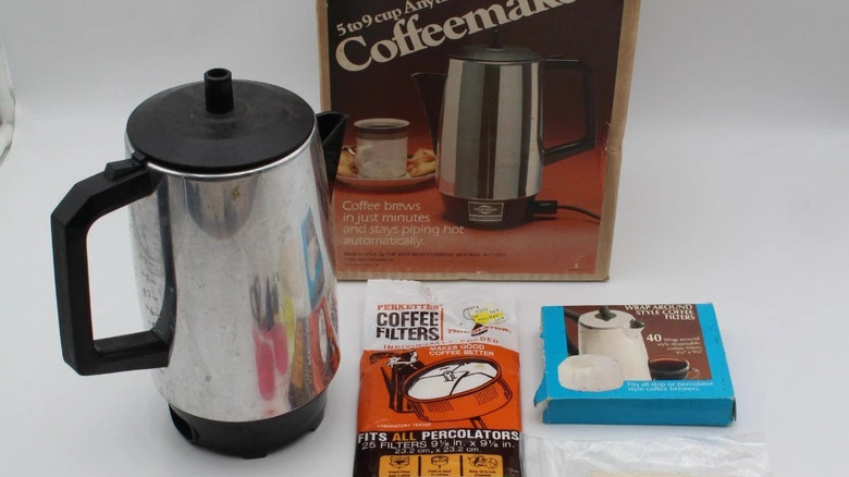 Vintage percolator with original box and bag of filters.