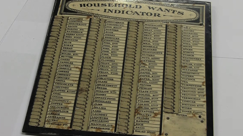 A vintage metal reusable grocery list.