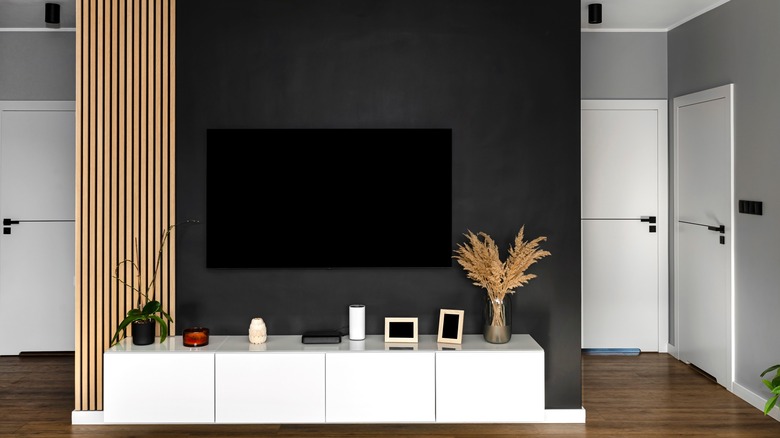 television on black wall