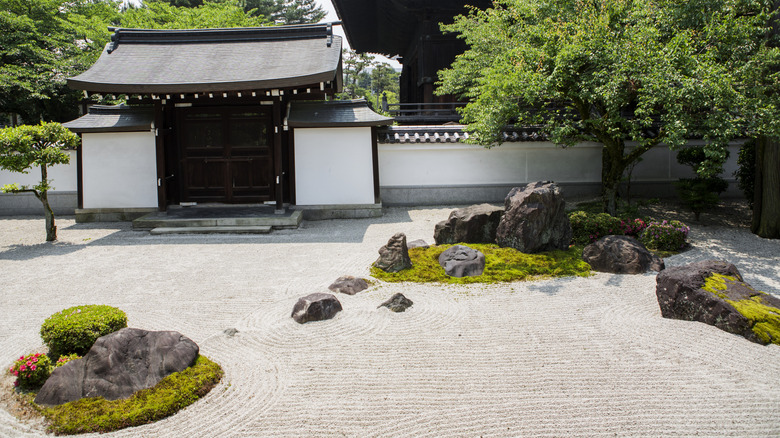 Zen garden with rocks and raked gravel