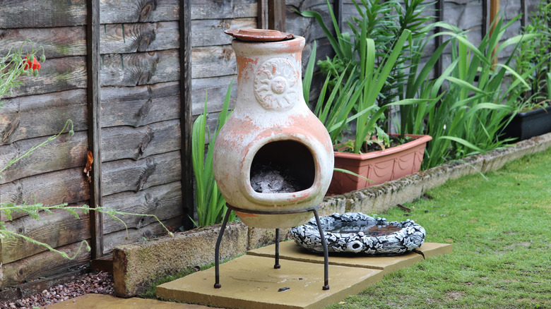 Clay chiminea in garden