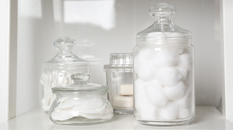 Cotton products on bathroom shelf