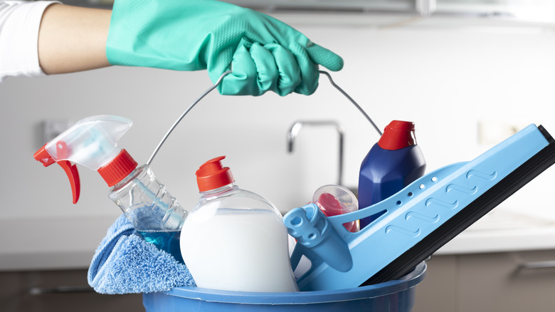 Cleaning products in bucket