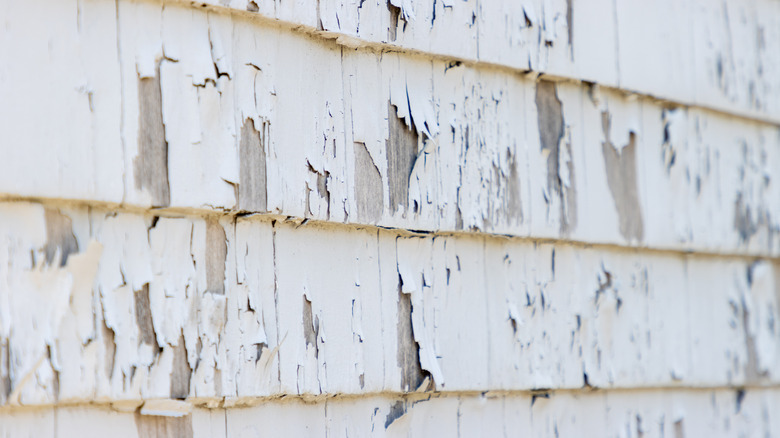 Discolored white siding of a home