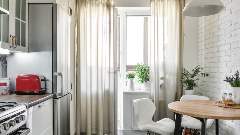 Linen drapes in a small kitchen