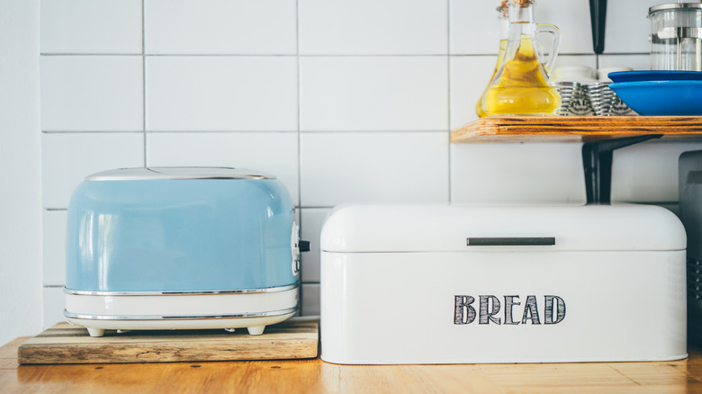 Vintage bread box and toaster in a ktichen