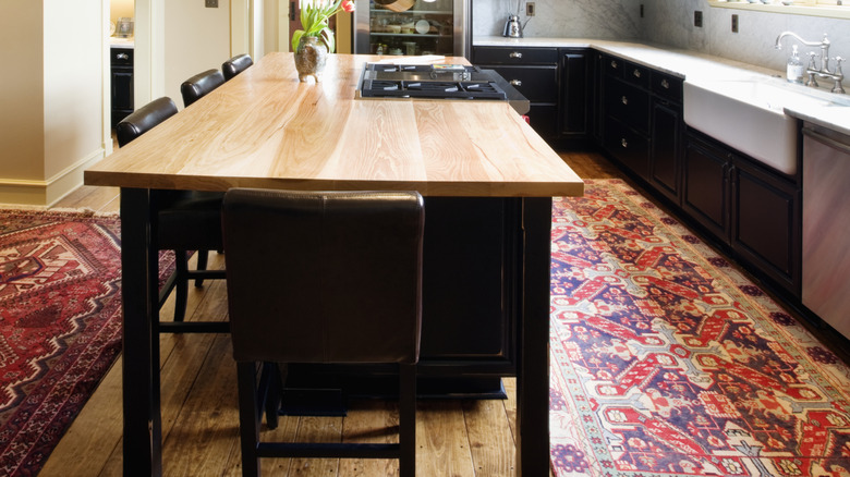 Kitchen with area rugs on the floor