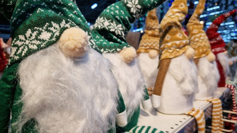 Closeup of plush gnome characters in different colors