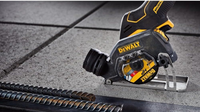 DeWalt cut-off tool on rough tile surface with grout edges