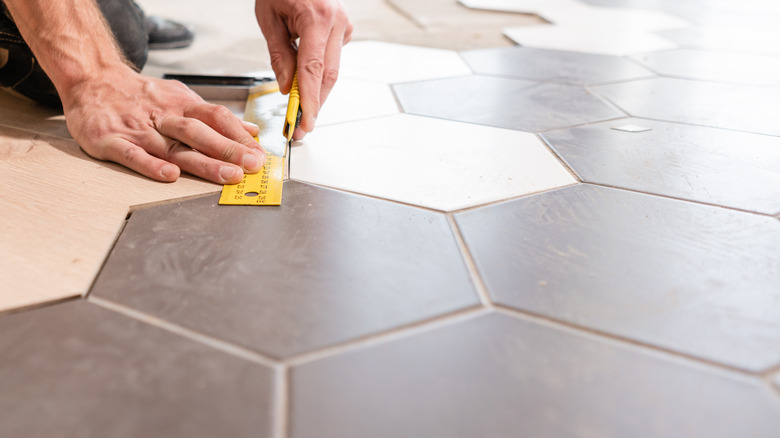 Laminate flooring alongside wood flooring