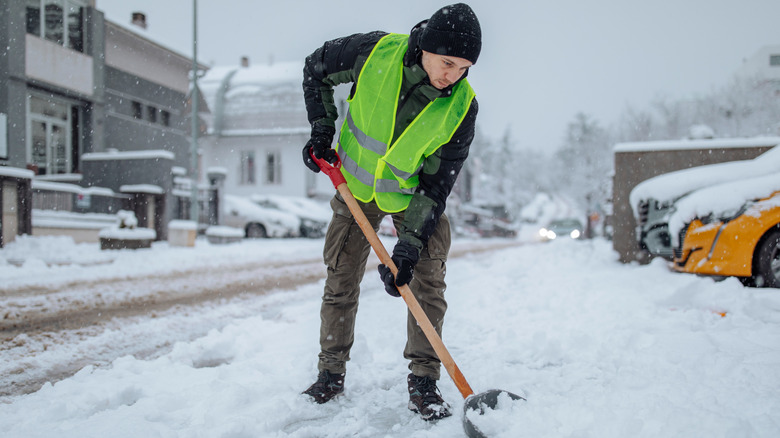 A person shoveling snow