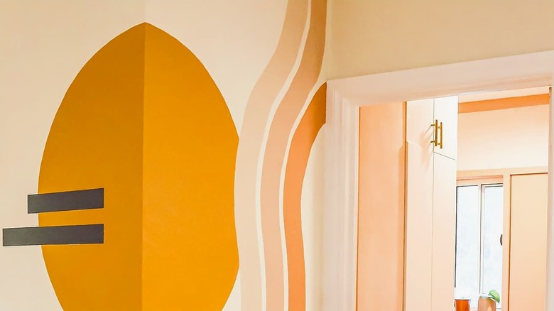 Asymmetrical stripes and abstract shapes on a wall