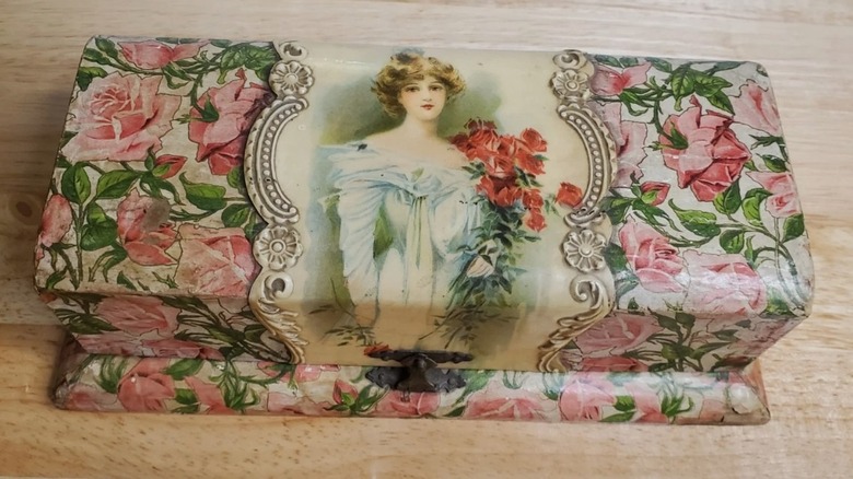 Celluloid vanity box with Victorian woman painted on it