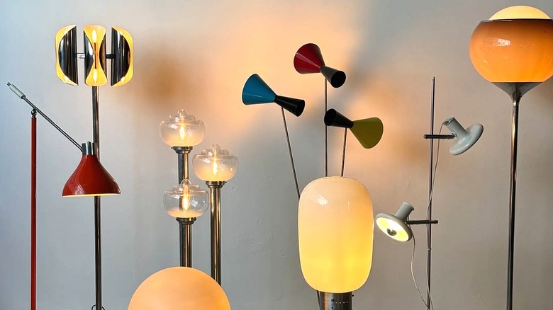 A collection of colorful and sculptural mid-century floor lamps.