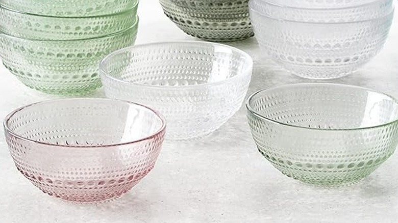 Clear, green, and pink-tinted glass cereal bowls
