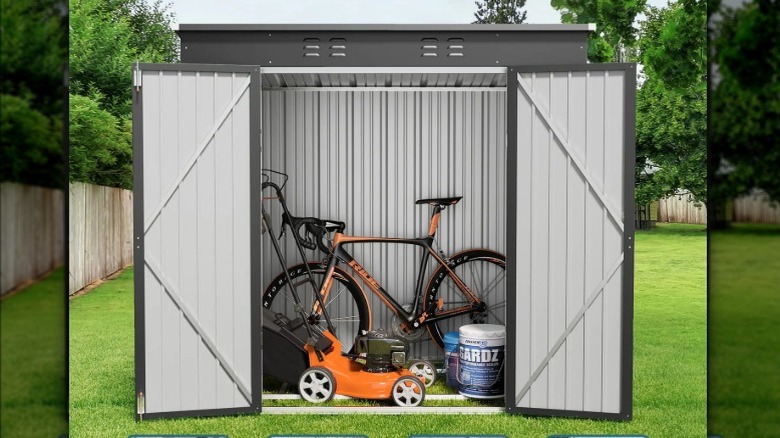 The Lofka shed full of tools and a bike.
