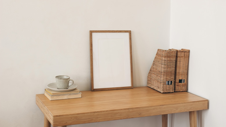 Two magazine files on a desk in a Scandi-style interior
