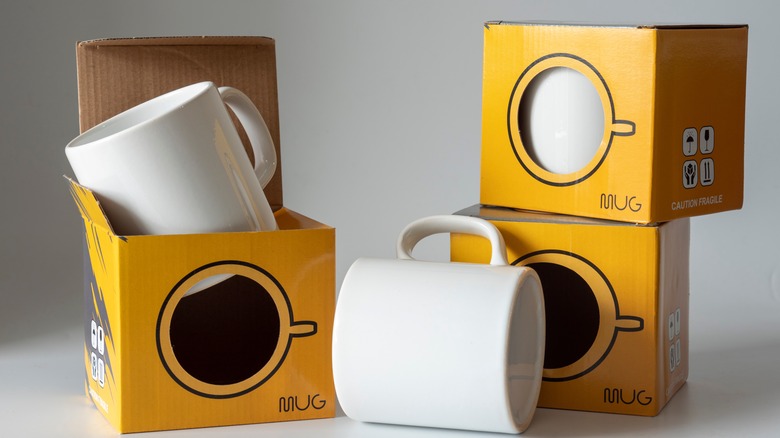 mugs in storage container