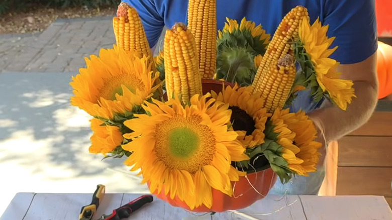 bundt pan floral arrangement with corn and sunflowers