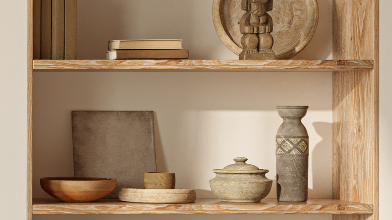 recessed shelf with plates and vases