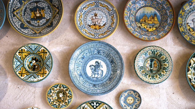 vintage plates displayed on a wall