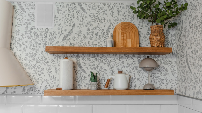 Wallpaper behind open kitchen shelves