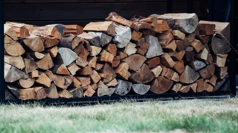 Stacks of logs in a yard