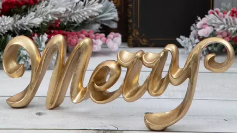 golden "merry" sign