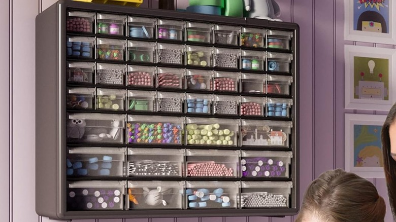 Akro-Mils 44-Drawer Storage Cabinet mounted on wall