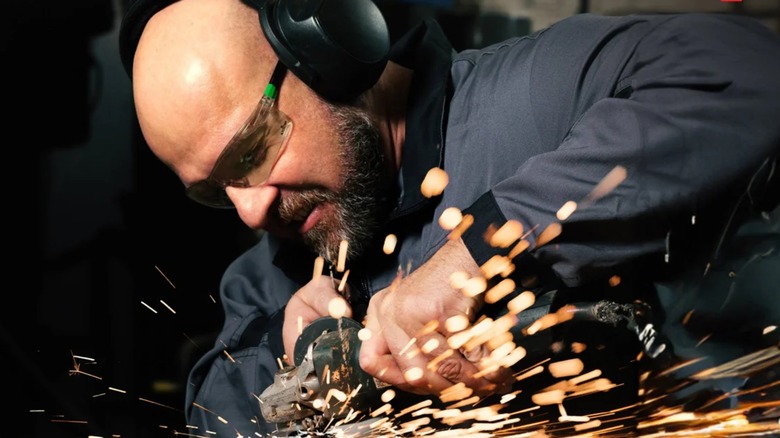 Man wearing NoCry Tinted Safety Glasses