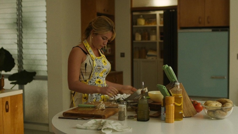 Florence Pugh as Alice in the kitchen in Don't Worry Darling (2022)