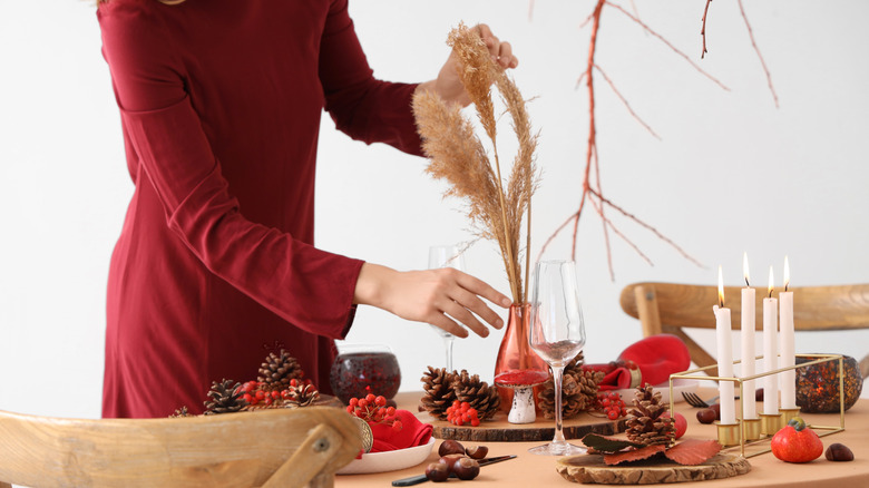 A person decorating for Thanksgiving