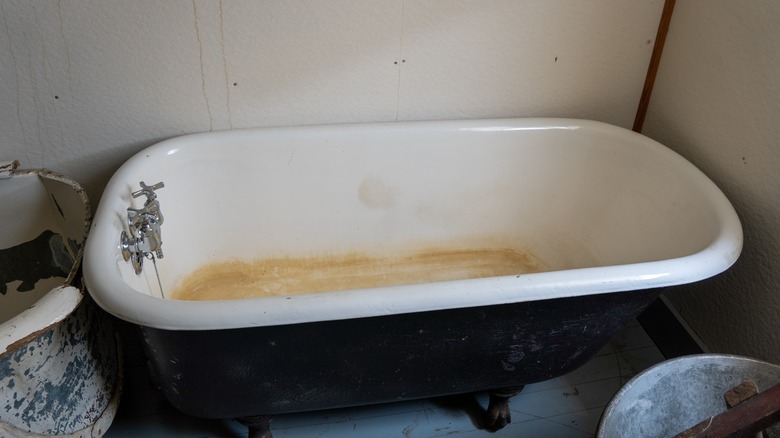 Old stained bathtub