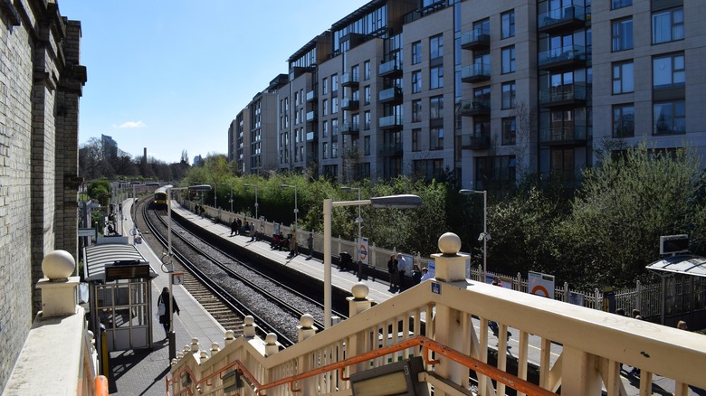 Train track next to apartment building