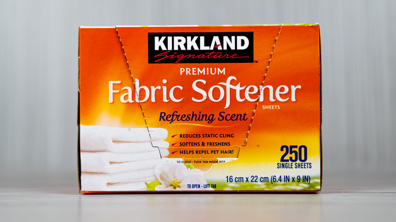 An orange box of Kirkland brand fabric softener sheets.