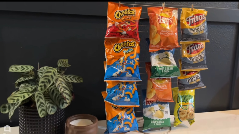 Snack display using a cooling rack and paper towel holder.