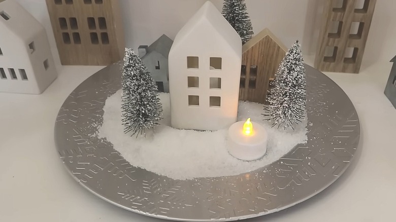 Silver snowflake charger with a snowy scene on top