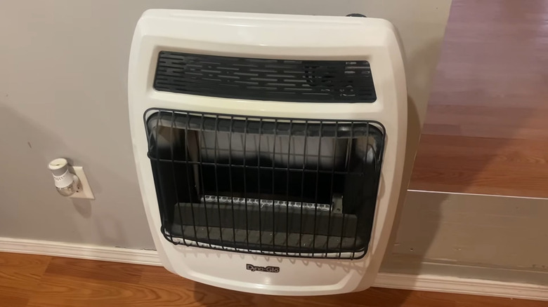 Ventless gas wall heater installed on wall