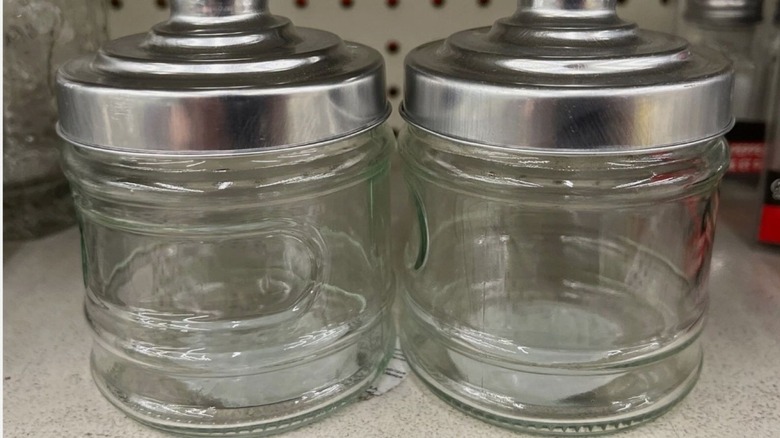 Two glass jars with lids