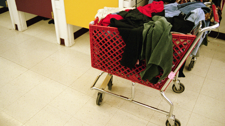 An abandoned cart full of clothes