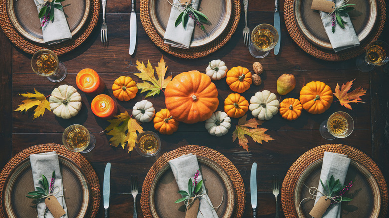 Pumpkins lined up as a table centerpiece